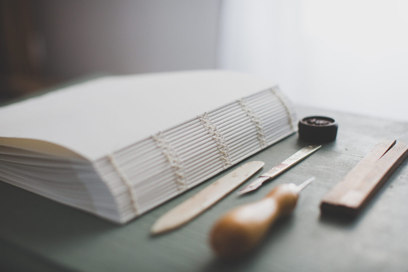 Book-Binding-1-2-scaled-1350×900